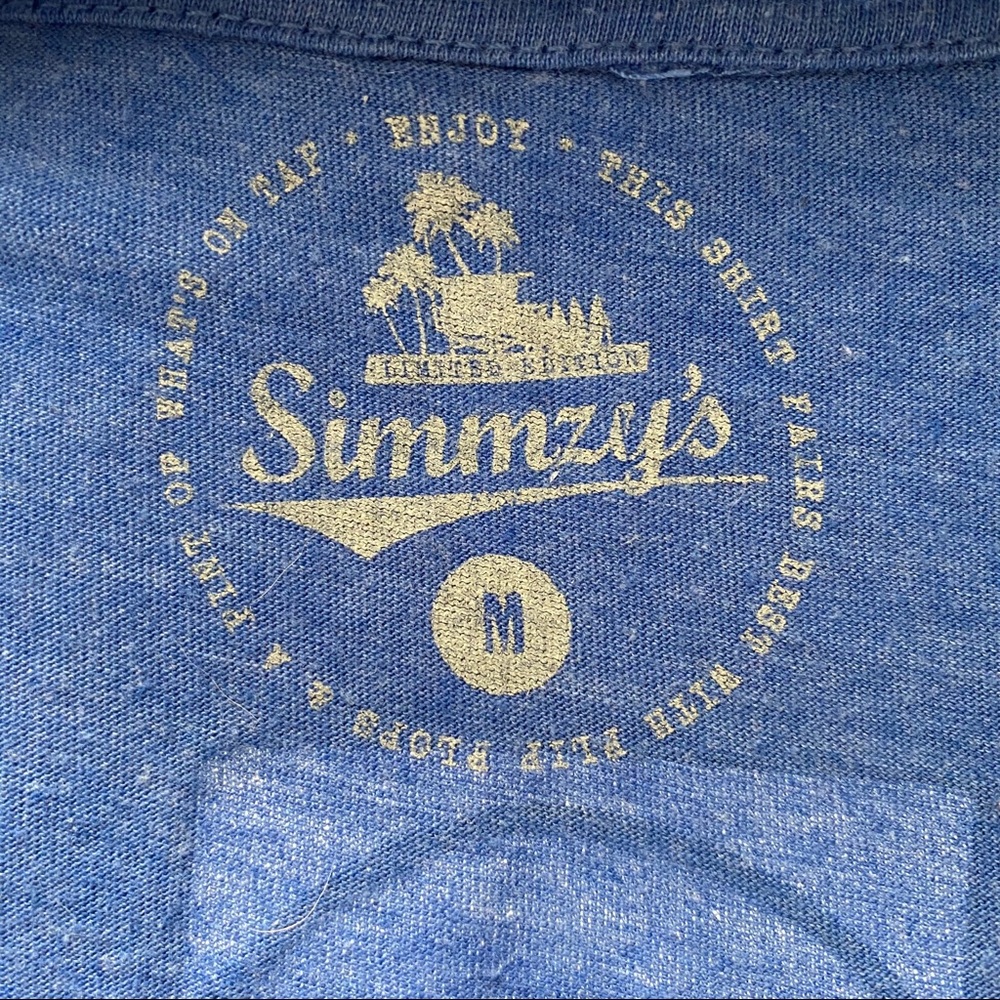 Simmzy’s blue v-neck tee. - Picture 3 of 3
